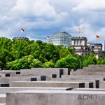 The Reichstag is visible behind the Holocaust Memorial