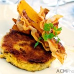 Polenta crusted fish cake with crispy bacon